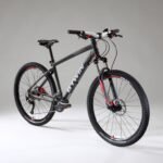VTT tout suspendu Rockrider ST 540 S noir et bleu avec amortisseur.