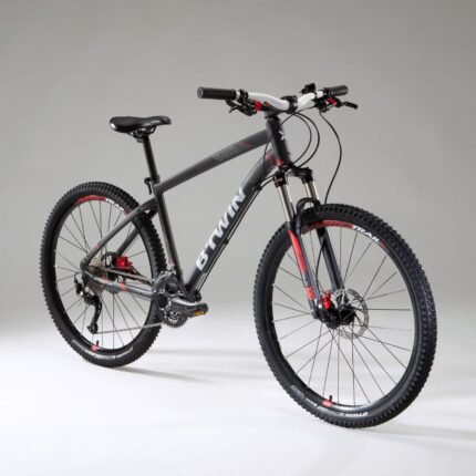 VTT tout suspendu Rockrider ST 540 S noir et bleu avec amortisseur.