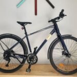 Vélo électrique Gitane Soho 2 gris anthracite batterie intégrée.